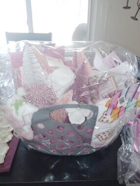 Pink Holiday Gift Basket with Decorative Trees and Accessories
